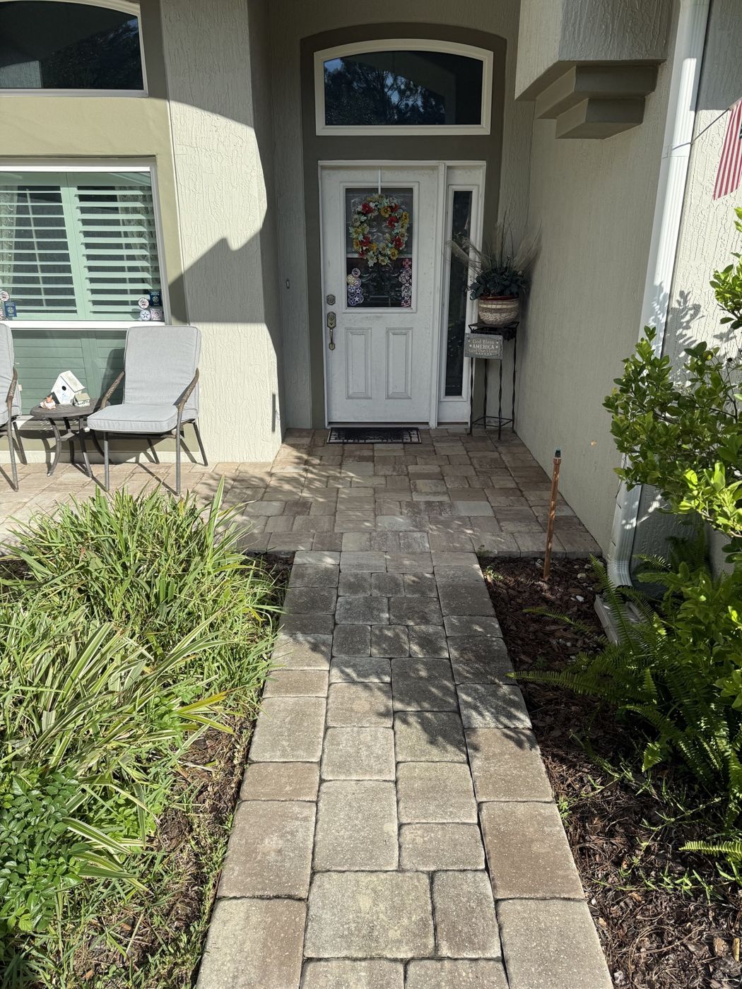 Front entry pavers, before